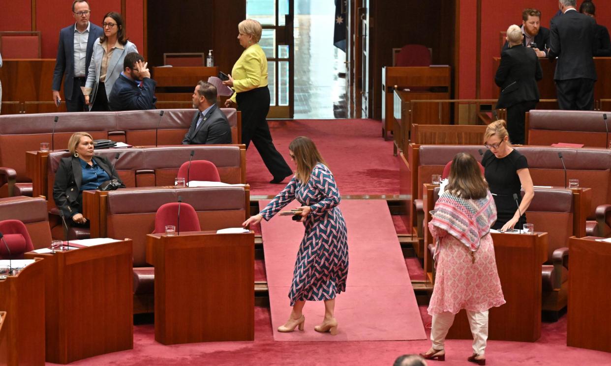 <span>Greens senators cross the floor to vote against the government on the Help to Buy bill in the Senate.</span><span>Photograph: Mick Tsikas/AAP</span>