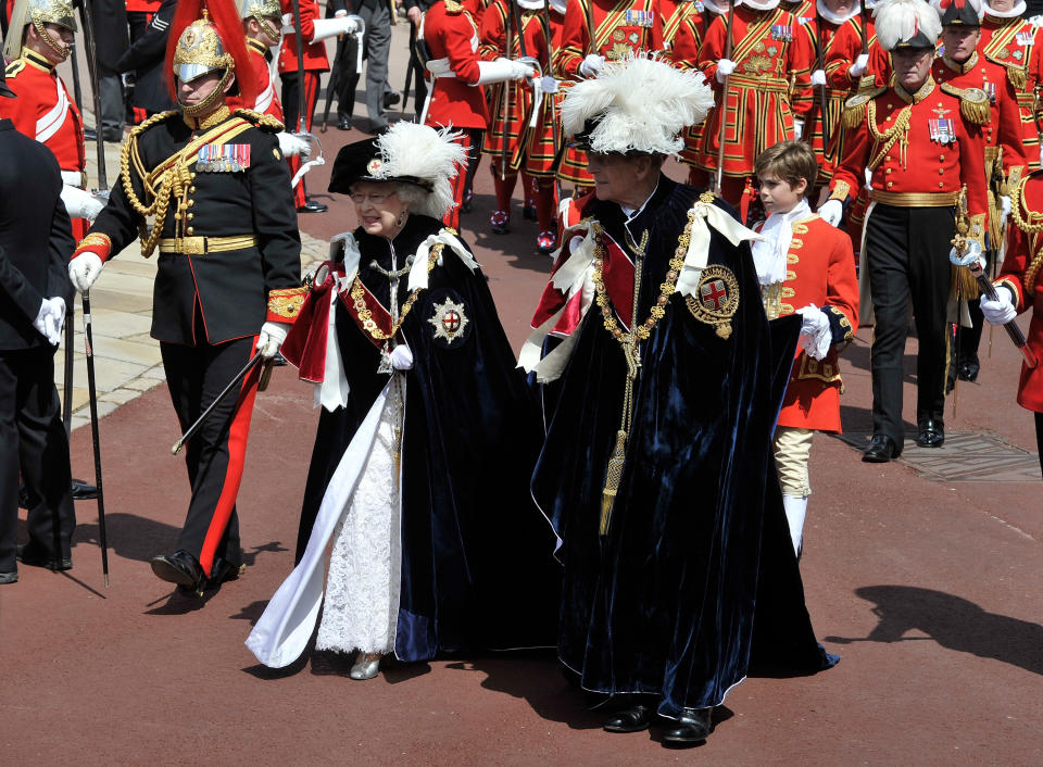 Queen Elizabeth II and Members Of The Royal Family Attend The Order Of The Garter Service