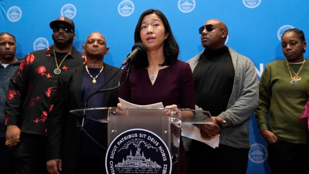 Boston Mayor Michelle Wu (center) issues a formal apology to Alan Swanson and Willie Bennett during a news conference Wednesday, in Boston, for their wrongful arrests following the 1989 death of Carol Stuart, whose husband, Charles Stuart, had orchestrated her murder. (Photo: Steven Senne/AP)