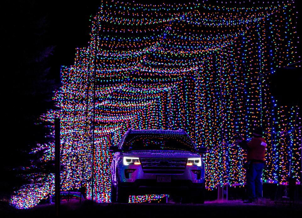 Visitors drive through a tunnel of 30,000 lights during the "Flight to the North Pole" at The Ingleside Hotel Country Christmas display in 2020. This year's event, Country Christmas, offers both walk-through and drive-through nights.