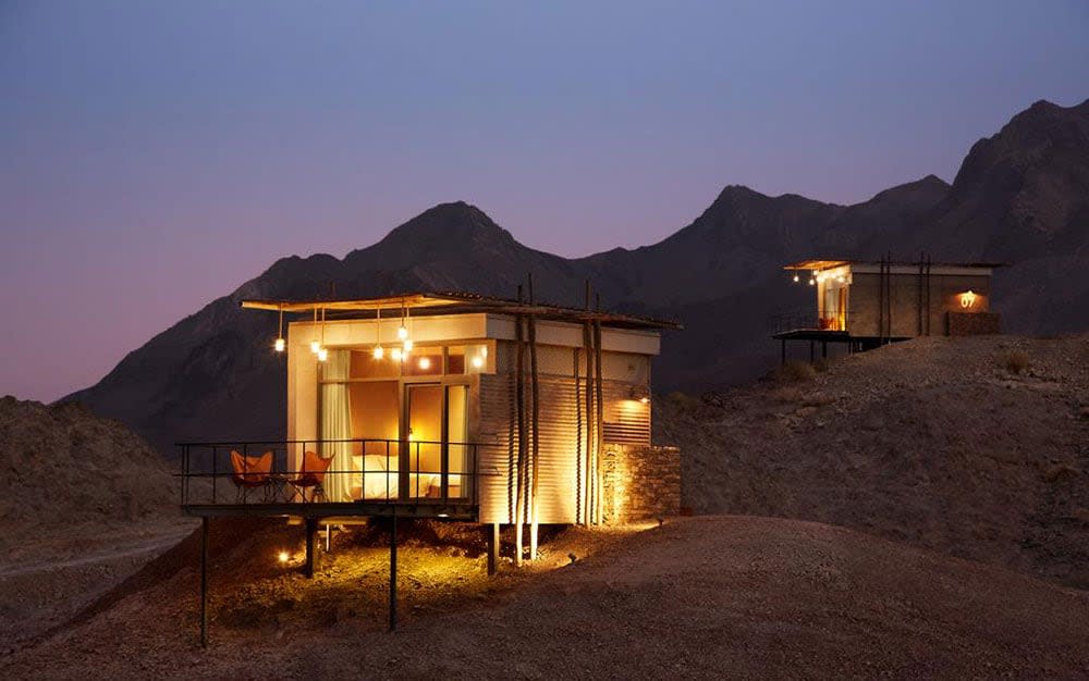 Dubai's Damani Lodges Resort consists of 20 pared-down container cabins cantilevered into the Hatta mountainside