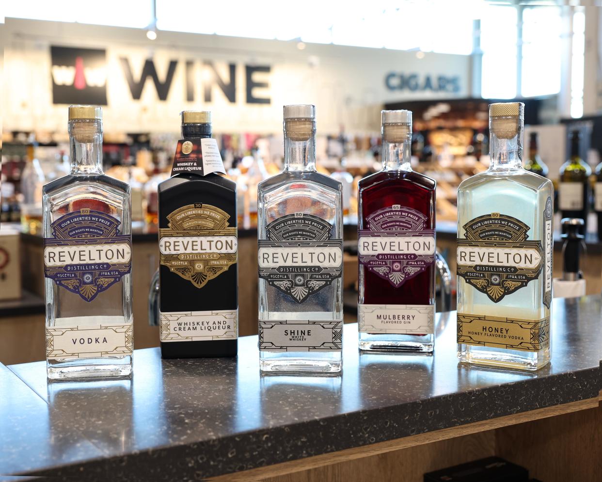 Revelton Distillery in Osceola, Iowa, offers boutique whiskeys and vodkas, including a mulberry-flavored gin. Wall to Wall Wine & Spirits in West Des Moines carries a selection of Iowa spirits, including an entire display of Revelton products.