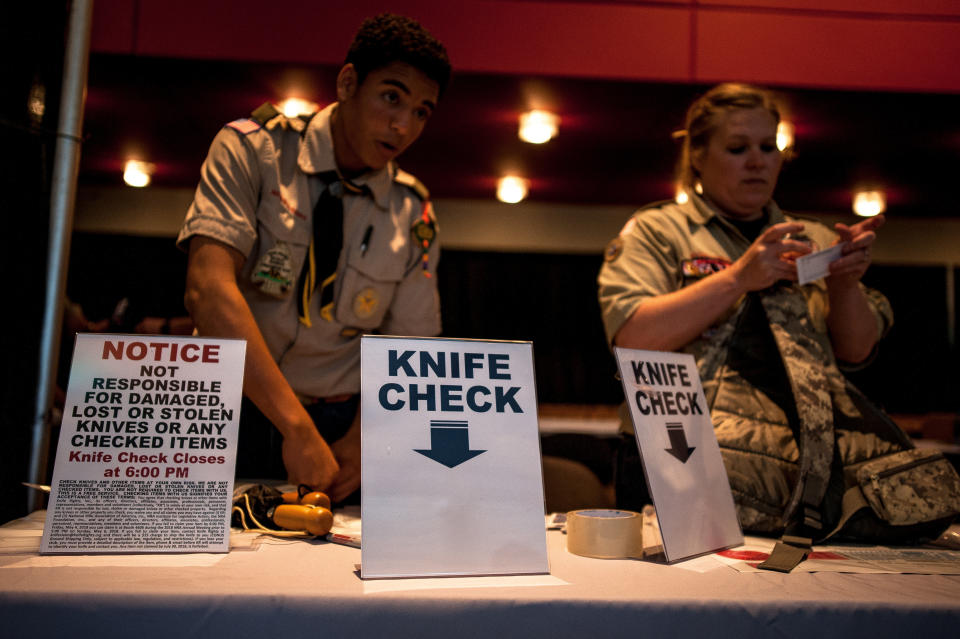 Local Boy Scouts work volunteer positions at the knife-check booth where&nbsp;attendees could check&nbsp;in knives, free of charge, before entering the arena were Trump would later speak and where weapons had been banned by the Secret Service days before.