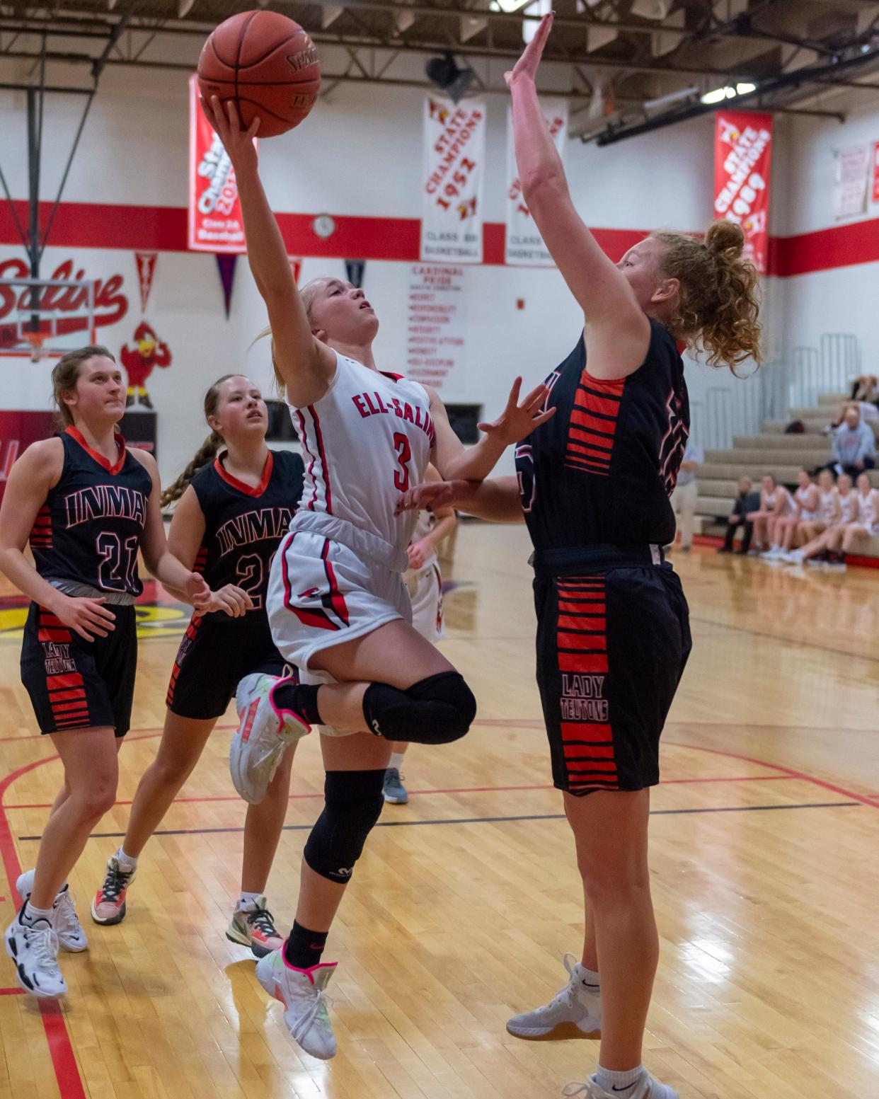 Ell-Saline's Bayleigh Schneider (3) launches a shot over an Inman defender Tuesday night at Brookville. 