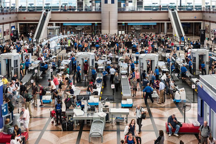 TSA security check at Denver international airport. (Photo by John Greim/LightRocket via Getty Images)