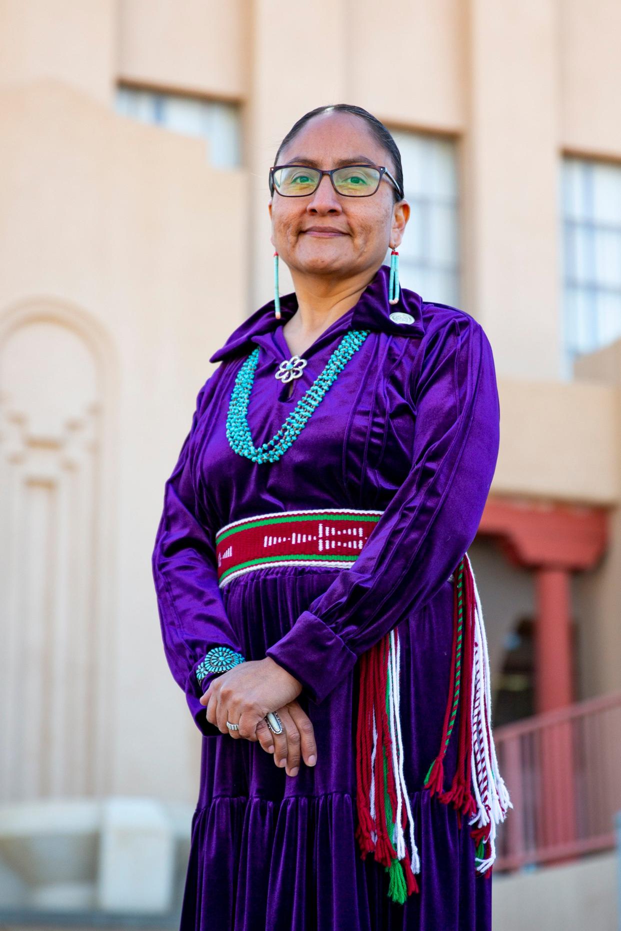 Wilhelmina Yazzie poses for a portrait in front of the McKinley County-Gallup Courthouse, the courthouse that first heard her case, on Wednesday, Jan. 11, 2023, in Gallup.