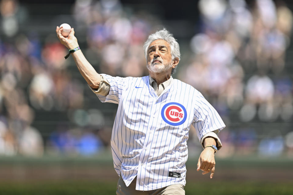 Actor Joe Mantegna throws out a ceremonial first pitch before a baseball game between the Chicago Cubs and the Tampa Bay Rays, Wednesday, May 31, 2023, in Chicago. (AP Photo/Quinn Harris)