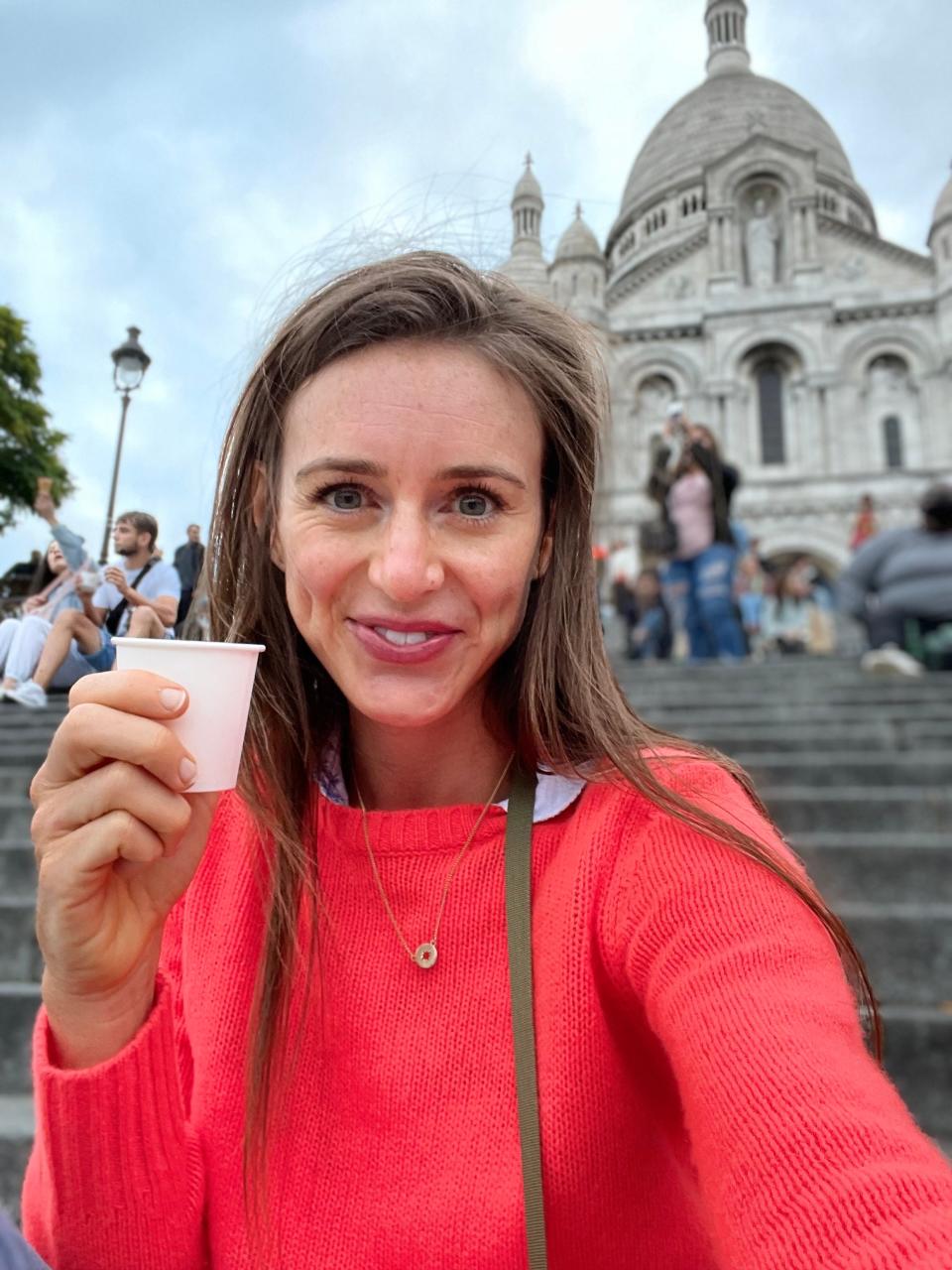 When money became tight, Katie Jackson and her traveling companion bought a 4 euros ($4.72) bottle of wine and sat on the Sacré-Cœur Basilica steps for a bird's-eye view of the sunset.