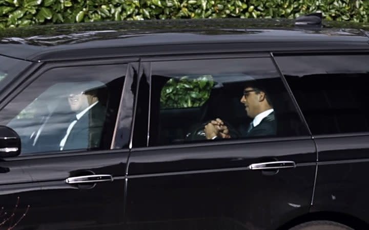 Prime Minister Rishi Sunak (right) leaves the Culloden Hotel in Belfast - Liam McBurney/PA