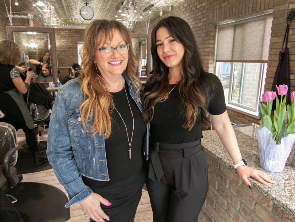 Krystal McLeod, left and Nicole Bolis, owners of East Main Salon in Brighton shown Wednesday, May 4, 2022, kept above water throughout the pandemic.