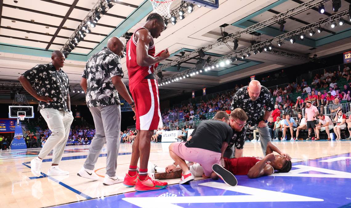 Nov 24, 2023; Paradise Island, BAHAMAS; Arkansas Razorbacks guard Tramon Mark (12) lays injured on the ground during the second half against the North Carolina Tar Heels at Imperial Arena.