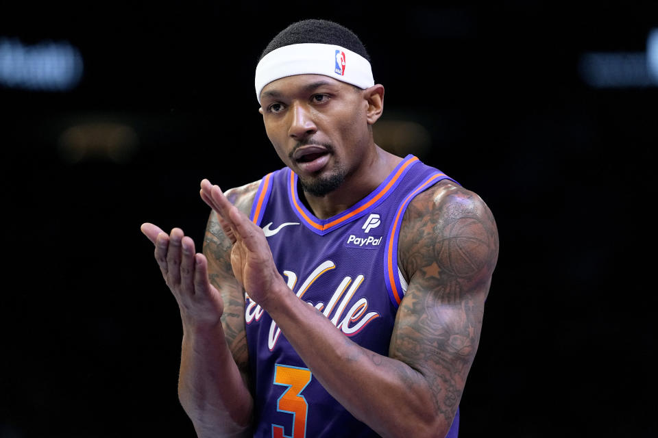 Phoenix Suns guard Bradley Beal (3) celebrates after a basket against the Los Angeles Lakers during the first half of an NBA basketball game, Friday, Nov. 10, 2023, in Phoenix. (AP Photo/Matt York)