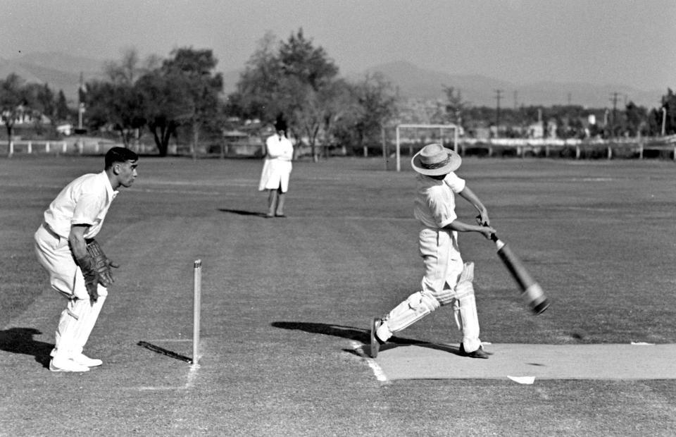 IMAGE: A cricket match (Peter Stackpole / The LIFE Picture Collection via Getty Images)