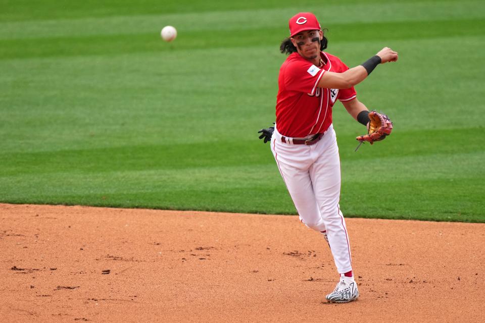 Cincinnati Reds shortstop Edwin Arroyo (80) throws to first base for an out in the eighth inning during a MLB spring training baseball game, Monday, Feb. 26, 2024, at Goodyear Ballpark in Goodyear, Ariz.