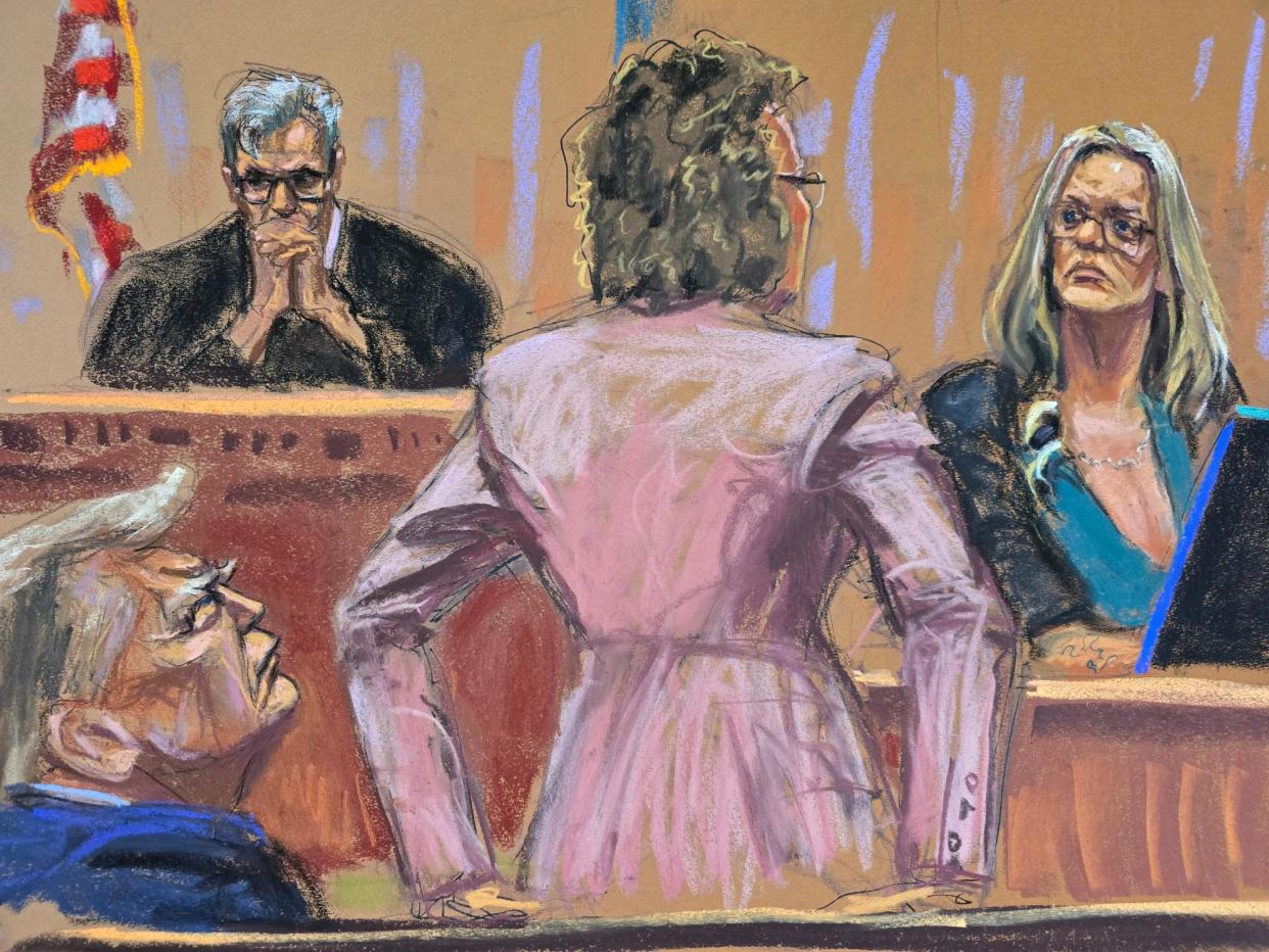 <span>Donald Trump watches as Stormy Daniels is questioned by defense attorney Susan Necheles in court in New York on Thursday.</span><span>Photograph: Jane Rosenberg/Reuters</span>