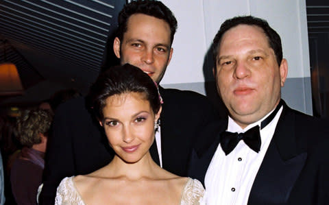 Harvey Weinstein with Ashley Judd, who alleges he harassed her - Credit:  Eric Charbonneau