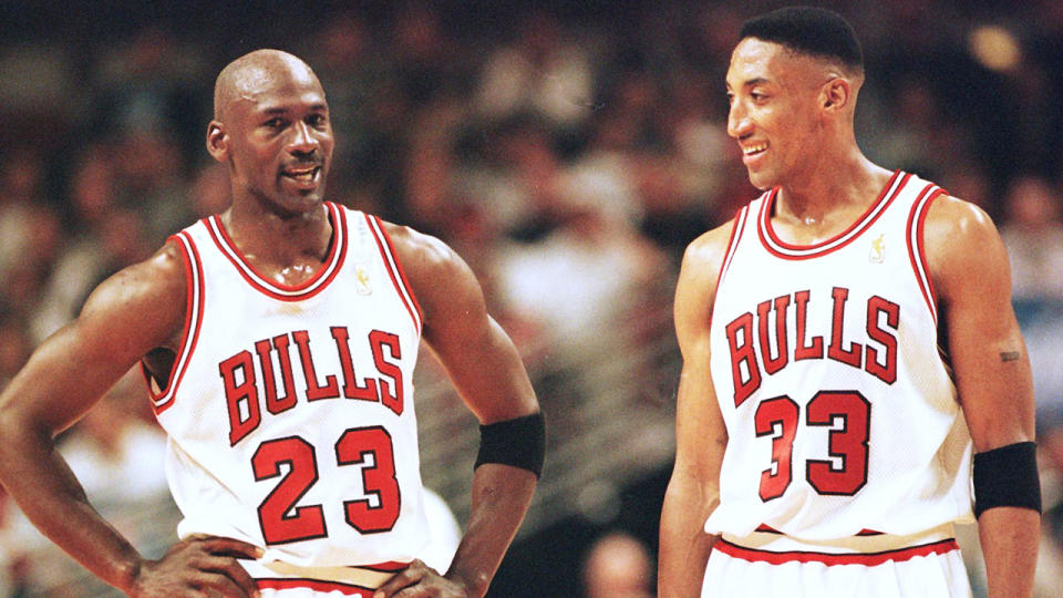 Michael Jordan and Scottie Pippen standing during a game for the Chicago Bulls