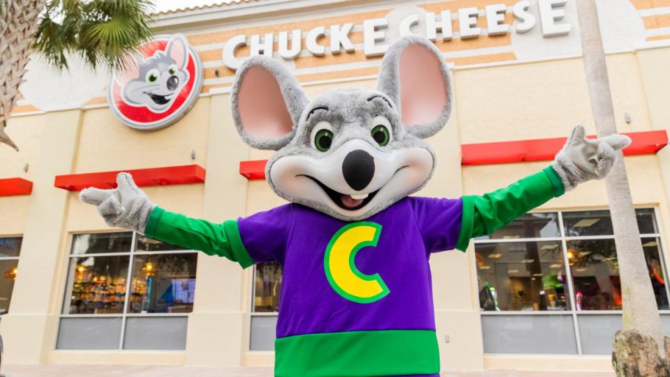 Chuck E cheese mascot and store