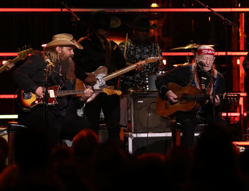 Chris Stapleton, left, and Willie Nelson perform during the Rock & Roll Hall of Fame Induction Ceremony on Nov. 3, 2023 at Barclays Center in New York.