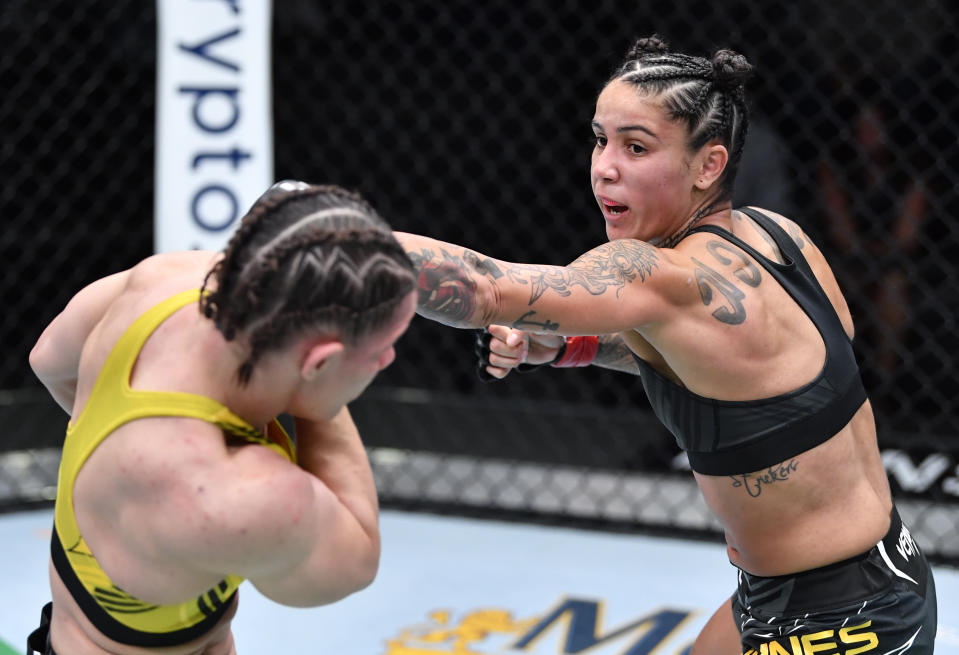 LAS VEGAS, NEVADA – OCTOBER 16: (R-L) Istela Nunes of Brazil punches Ariane Carnelossi of Brazil in a strawweight fight during the UFC Fight Night event at UFC APEX on October 16, 2021 in Las Vegas, Nevada. (Photo by Chris Unger/Zuffa LLC)