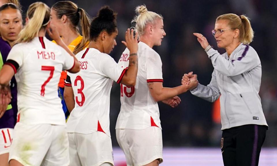 England manager Sarina Wiegman congratulates her players after the 8-0 win over North Macedonia