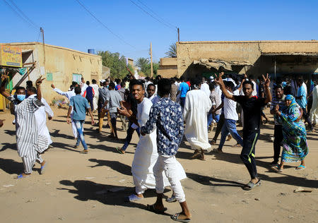 Sudanese demonstrators march along the street during anti-government protests after Friday prayers in Khartoum, Sudan January 11, 2019. REUTERS/Mohamed Nureldin Abdallah