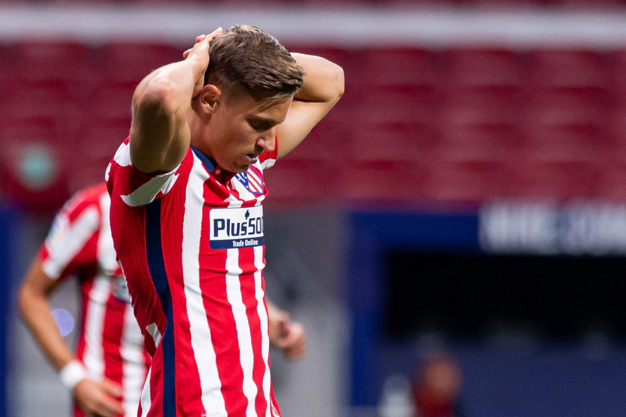 MADRID, SPAIN - JULY 19: (BILD ZEITUNG OUT) Marcos Llorente of Atletico de Madrid looks dejected during the Liga match between Club Atletico de Madrid and Real Sociedad at Wanda Metropolitano on July 19, 2020 in Madrid, Spain. Football Stadiums around Europe remain empty due to the Coronavirus Pandemic as Government social distancing laws prohibit fans inside venues resulting in all fixtures being played behind closed doors. (Photo by Alejandro Rios/DeFodi Images via Getty Images)