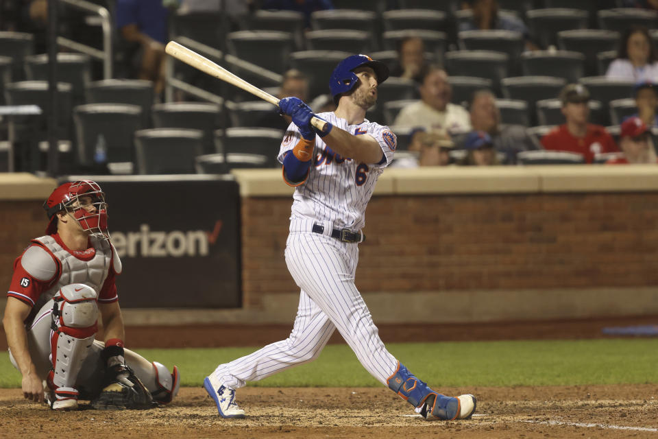 New York Mets' Jeff McNeil hits a home run during the seventh inning of a baseball game against the Philadelphia Phillies, Sunday, Sept. 19, 2021, in New York. (AP Photo/Jason DeCrow)