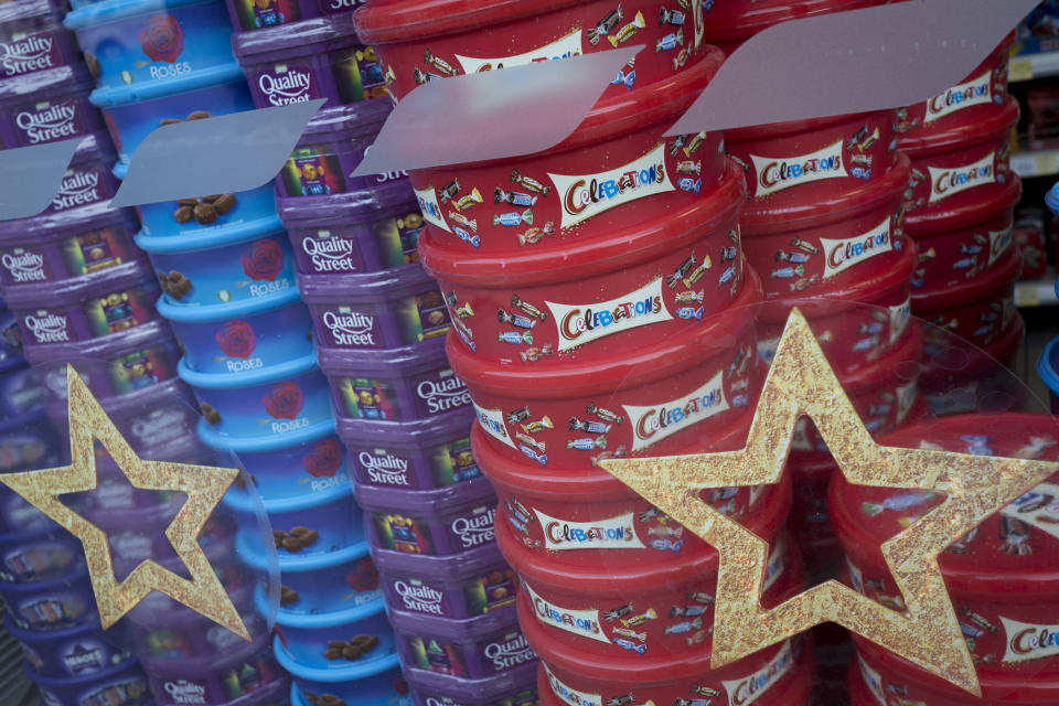 A display of assorted chocolate and sweet boxes of Nestle Quality Street, Cadburys Roses and Heroes plus Mars Celebrations piled up in the Christmas themed window of a local Tescos supermarket, on 20th November 2019, at Smithfield in the City of London, England. (Photo by Richard Baker / In Pictures via Getty Images)