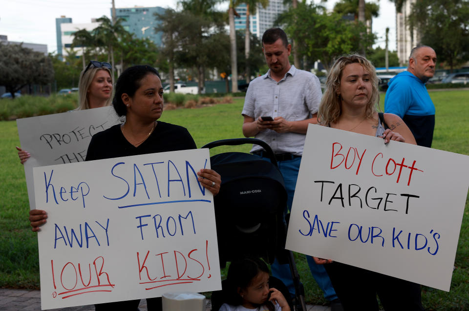 MIAMI, FLORIDA - JUNE 01: (L-R) Jennifer Vazquez and Melissa Caicedo protest outside of a Target store on June 01, 2023 in Miami, Florida. The protesters were reacting to Pride Month merchandise featuring the rainbow flag in support of the rights of the lesbian, gay, bisexual, transgender, and queer communities that had been sold at Target stores. Target removed certain items from its stores and made other changes to its LGBTQ+ merchandise after a backlash from some customers. (Photo by Joe Raedle/Getty Images)