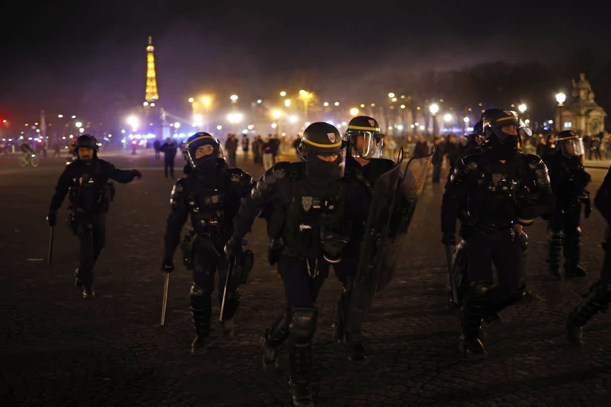 French police face protesters as clashes erupt on Place de la Concorde (EPA)