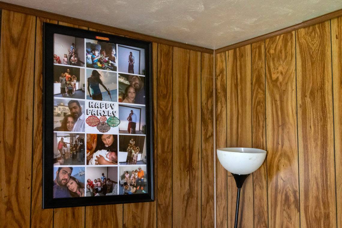 A photo inside Robert Parson’s home that shows him with Cindy Rodriguez-Singh and her family, including Noel Rodriguez-Alvarez in the blue shirt, in Everman, Texas, on Tuesday, March 28, 2023. Noel has not been seen since November 2022, and police thoroughly searched the home during their investigation.