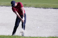 Jason Day of Australia hits out of a sand trap on the second fairway of the Torrey Pines South Course during the first round The Farmers Insurance golf tournament in San Diego, Thursday, Jan. 23, 2020. (AP Photo/Alex Gallardo)