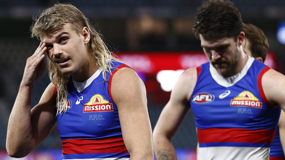 Bailey Smith walks off the ground after the Western Bulldogs' loss to St Kilda.