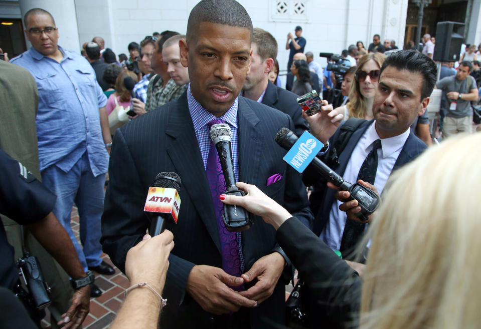 In this photo taken on April 29, 2014, Sacramento, Calif., Mayor Kevin Johnson speaks to reporters after his comments about the penalties imposed on Los Angeles Clippers owner Donald Sterling by the NBA at a news conference at Los Angeles City Hall. Last year Johnson almost single-handedly kept the Kings NBA franchise in Sacramento, staging a late-game comeback to snatch the team away from a Seattle billionaire. This spring he began raising his national political profile by taking over as the head of the U.S. Conference of Mayors, then acting as spokesman for the NBA players as the controversy over racist remarks by the Clippers' owner threatened to throw the basketball league into turmoil. (AP Photo/Nick Ut)