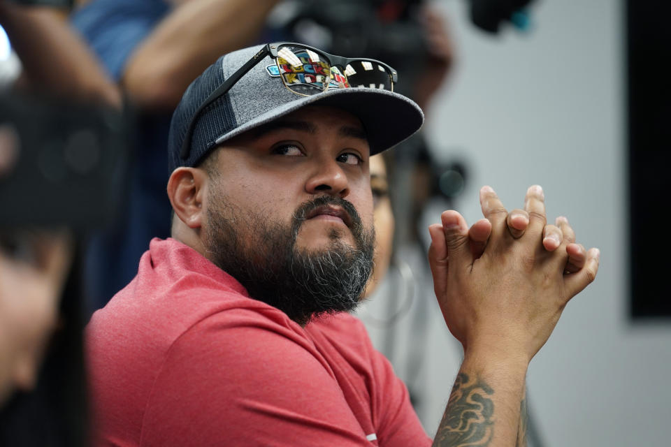 Alfred Garza III, father of school shooting victim Amerie Jo Garza, attends a special emergency city council meeting, Tuesday, June 7, 2022, in Uvalde, Texas, to reissue the mayor's declaration of a local state of disaster due to the recent school shooting at Robb Elementary School. Two teachers and 19 students were killed. (AP Photo/Eric Gay)