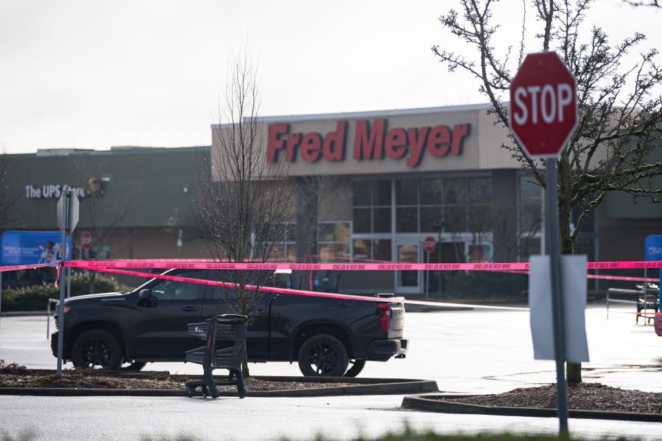 Part of the Fred Meyer parking lot at 3740 Market St NE is taped off as Salem Police investigate a triple shooting.