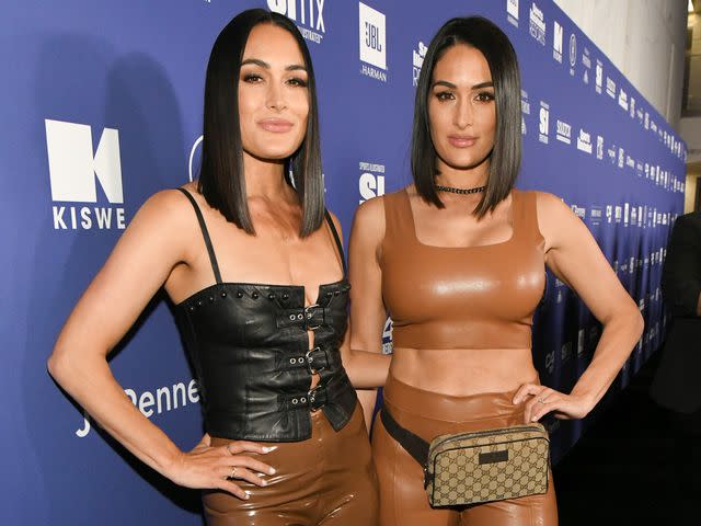 <p>Rodin Eckenroth/Getty</p> Brie Bella and Nikki Bella