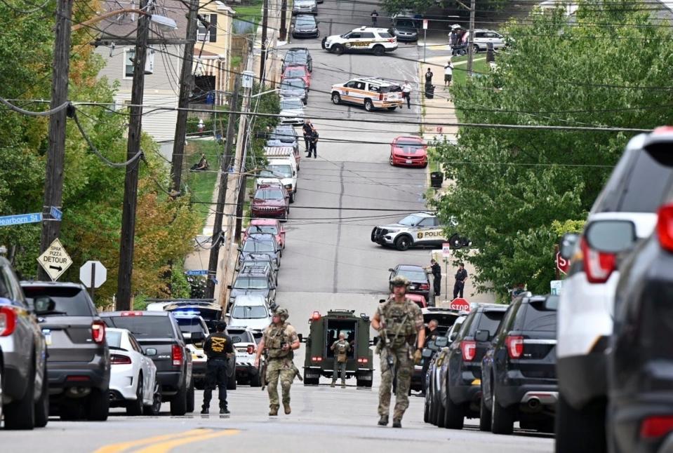 Pittsburgh police respond to a shooting in the suburb of Garfield (Pittsburgh Post-Gazette)