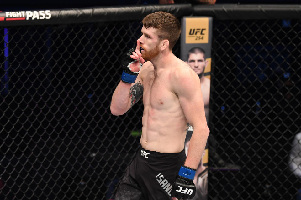 ABU DHABI, UNITED ARAB EMIRATES - OCTOBER 11:  Cory Sandhagen celebrates his victory over Marlon Moraes of Brazil in their bantamweight bout during the UFC Fight Night event inside Flash Forum on UFC Fight Island on October 11, 2020 in Abu Dhabi, United Arab Emirates. (Photo by Josh Hedges/Zuffa LLC via Getty Images)