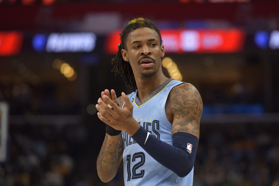 Memphis Grizzlies guard Ja Morant claps during Game 5 first-round playoff series against the Los Angeles Lakers Wednesday, April 26, 2023, in Memphis, Tenn. Due to off-the-court issues, the All-Star guard will serve a 25-game suspension this season. | Brandon Dill, Deseret News