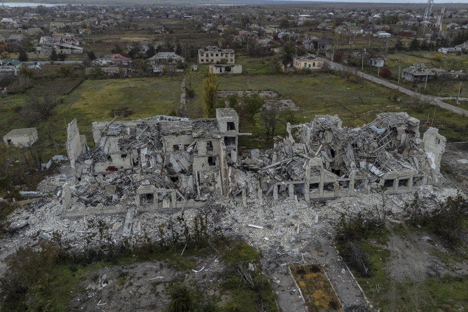 A destroyed school on the outskirts of a recently liberated village outskirts of Kherson, in southern Ukraine, Wednesday, Nov. 16, 2022. The Russian withdrawal from the only provincial capital it gained in nine months of war was one of Moscow most significant battlefield losses. Now that its troops hold a new front line, the Ukrainian military said through a spokesman, the army is planning its next move. (AP Photo/Bernat Armangue)