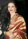 <p><b>Rekha: </b> </p> <p> Rekha is the epitome of style and is still considered as a diva of the Bollywood fraternity at 53. The personal style of Rekha is characterized by heavy kanjeevaram sarees with exotic jewelry. Rekha likes it grand! She loves to flaunt beautiful and sophisticatedly designed sarees with intricate pieces of jewelry. And, she does it all with elan!</p>
