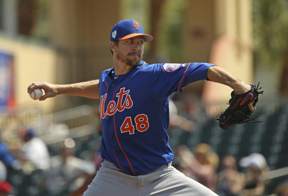 New York Mets pitcher Jacob deGrom (48) pitches during the fourth inning of a spring training baseball game against the Miami Marlins, Tuesday, March 12, 2019 in Jupiter, Fla. (David Santiago/Miami Herald via AP)