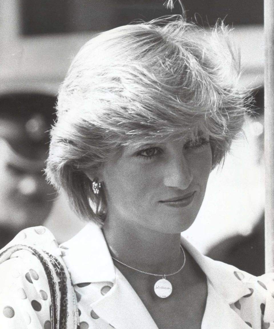 The late princess wore a pendant necklace etched with her son’s name.