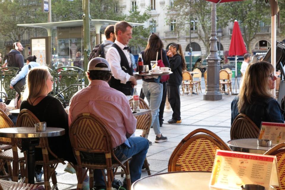 Restaurants in Paris are asking diners to tip more ahead of the Olympic games, even though it is not customary in France. Getty Images