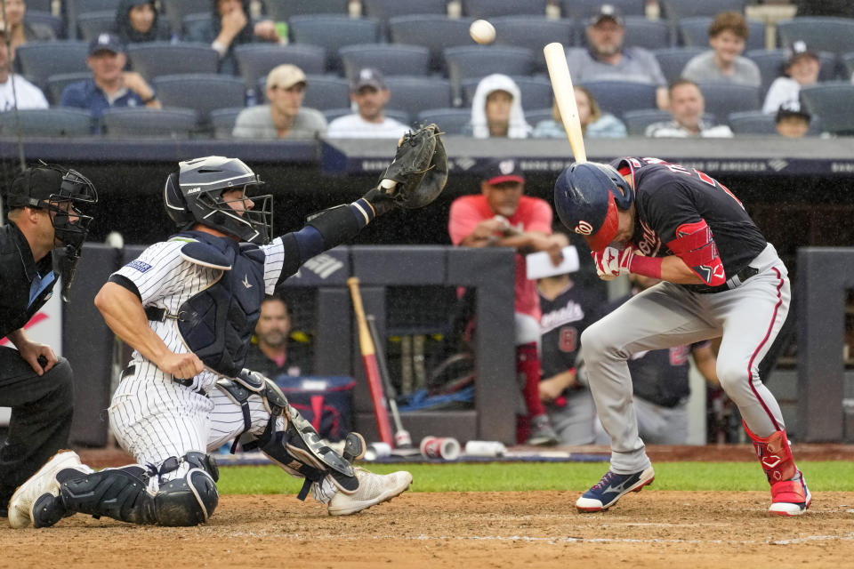 Washington Nationals' Lane Thomas is hit by a pitch by New York Yankees pitcher Clay Holmes in the ninth inning of a baseball game, Thursday, Aug. 24, 2023, in New York. The Nationals won 6-5. (AP Photo/Mary Altaffer)