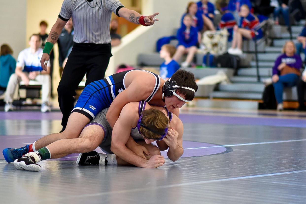 Van Meter's Jackson Boese wrestles an opponent during the West Central Activities Conference tournament on Saturday, Dec. 17, 2022, at West Central Valley.