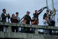 Demonstrators take part in a protest as a national strike continues in Bogota