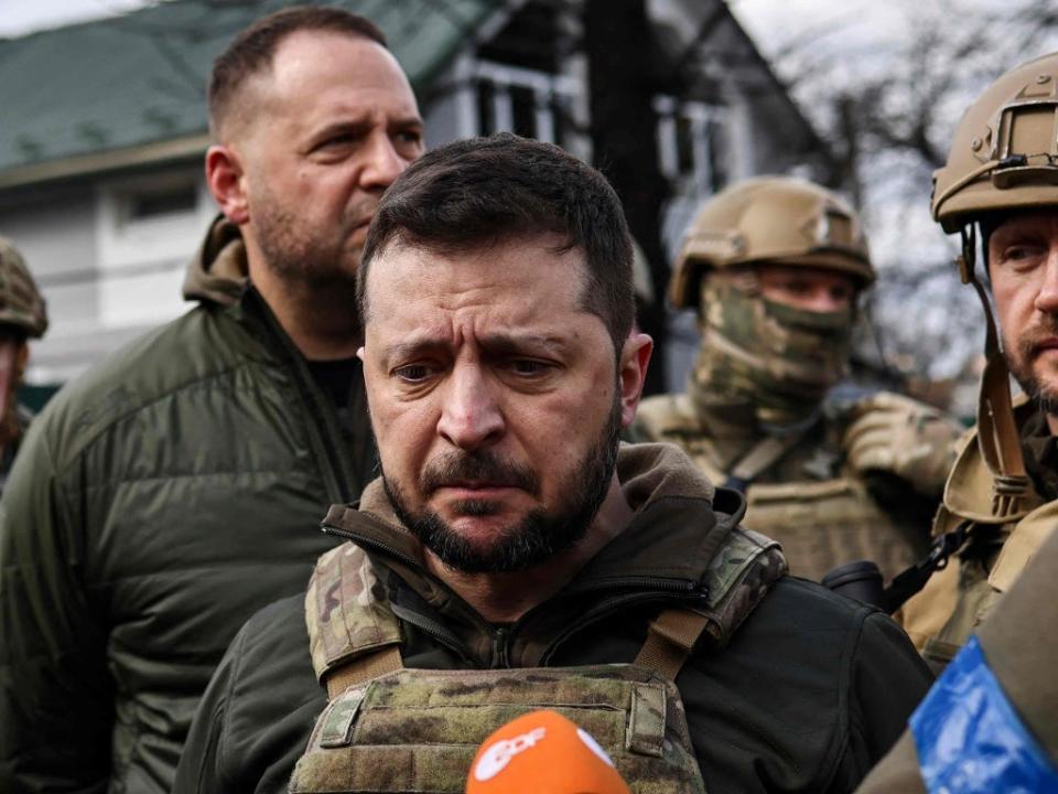 Ukraine’s president, Volodymyr Zelensky, speaks to the press in Bucha yesterday (AFP/Getty)